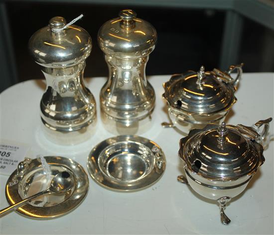 Pair of silver circular mouse dishes, salt & pepper mill & a pair of circular mustards